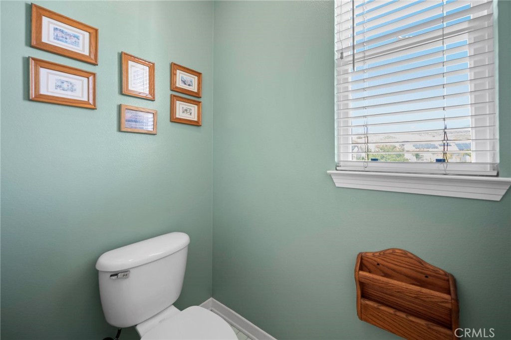 3262 Bluebird Circle Simi Valley, CA 93063 - Photo 34 of 43 a bathroom with a toilet and a window