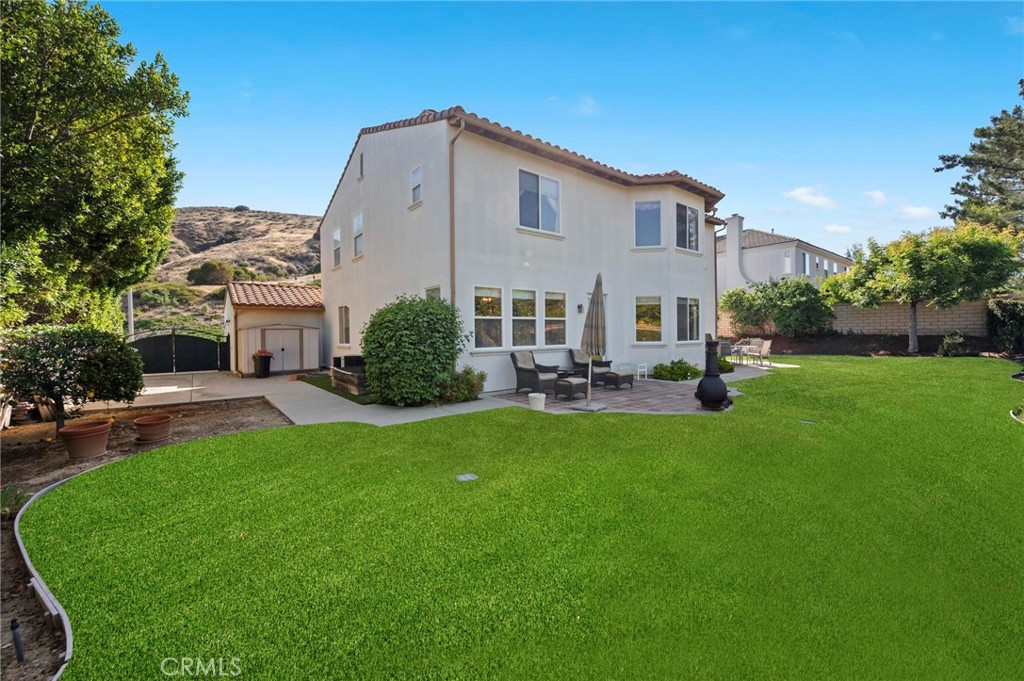 3262 Bluebird Circle Simi Valley, CA 93063 - Photo 39 of 43 a front view of a house with a yard