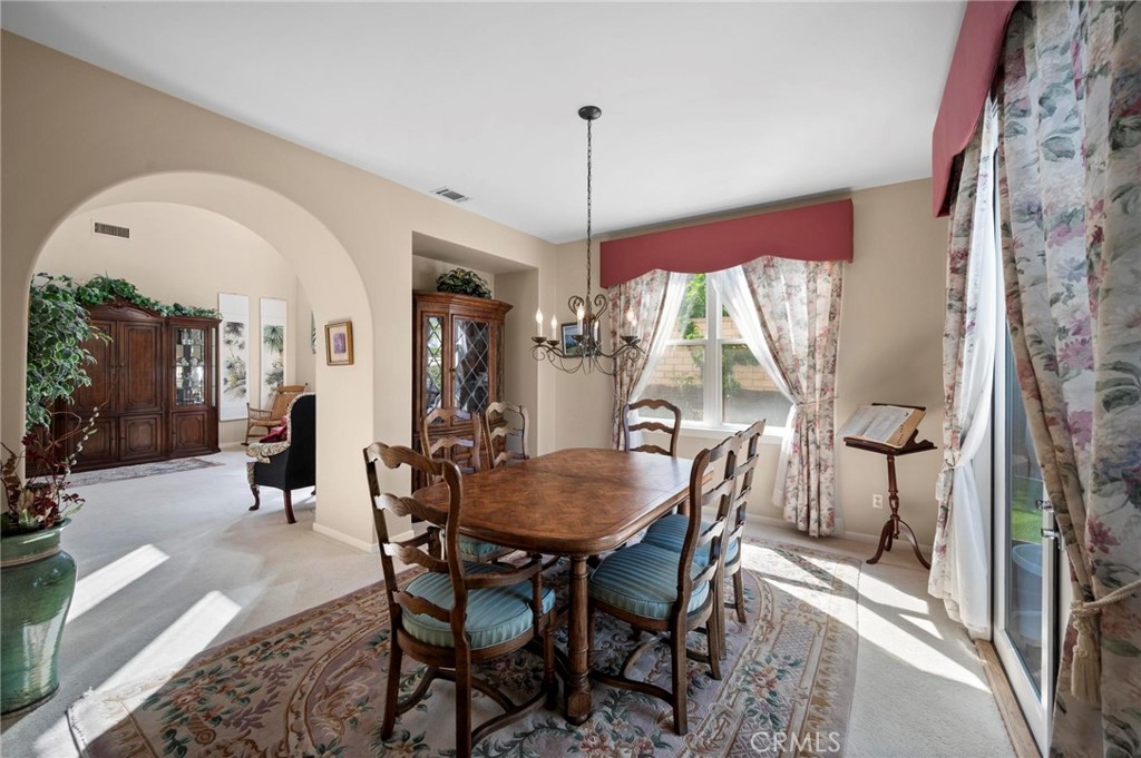 3262 Bluebird Circle Simi Valley, CA 93063 - Photo 8 of 43 a dining room with furniture window wooden floor
