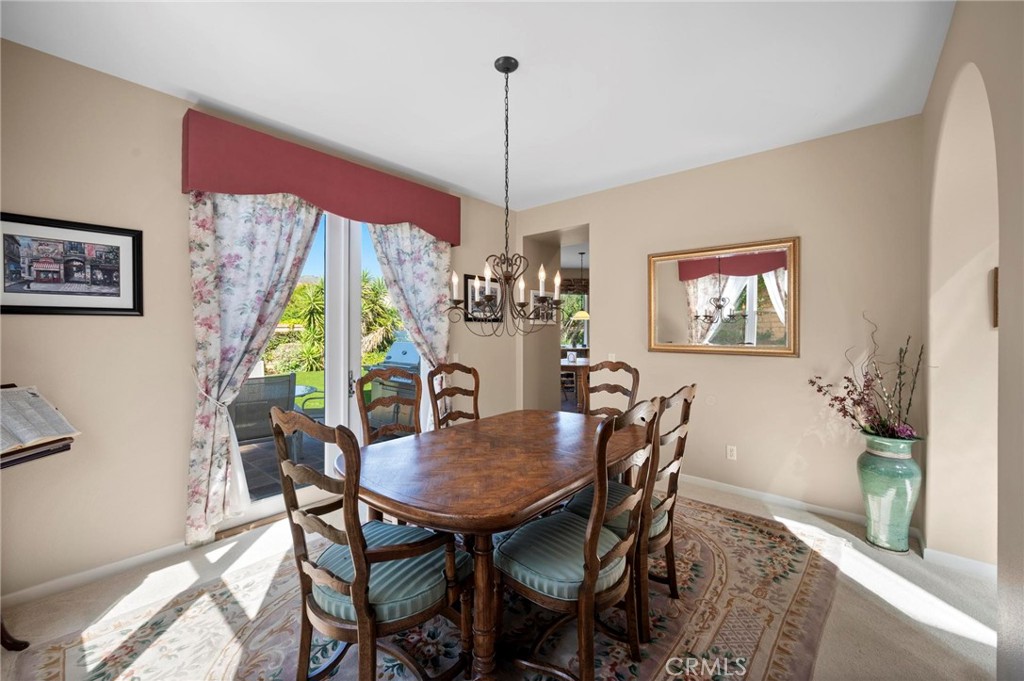 3262 Bluebird Circle Simi Valley, CA 93063 - Photo 9 of 43 a view of a dining room with furniture window and wooden floor