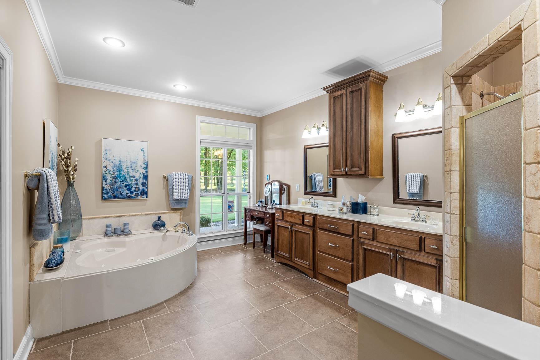8240 Brunswick Road Millington, TN 38053 - Photo 12 of 25 a large spacious bathroom with a tub double sink and mirror