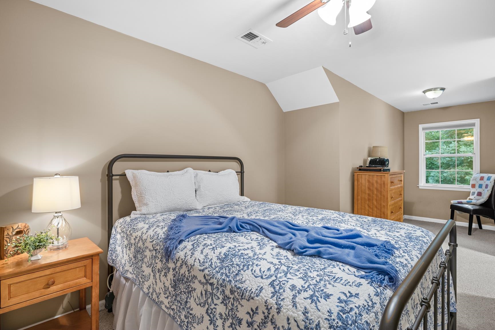 8240 Brunswick Road Millington, TN 38053 - Photo 21 of 25 a bedroom with a bed and a lamp on table