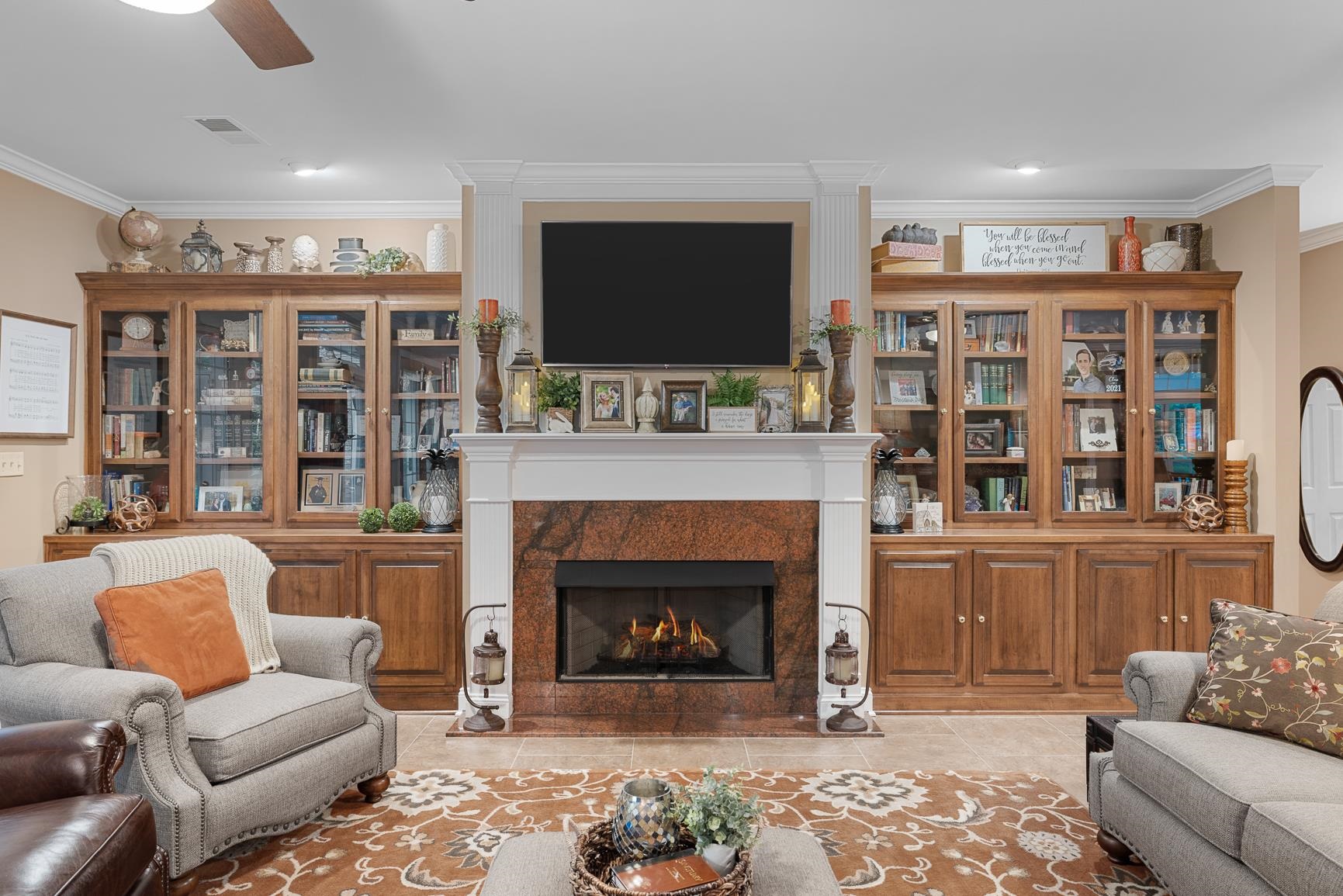 8240 Brunswick Road Millington, TN 38053 - Photo 10 of 25 a living room with furniture fireplace and flat screen tv