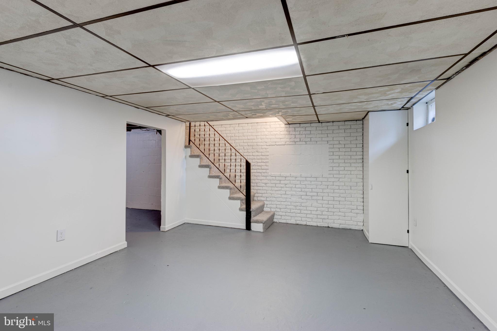 523 Academy Road Catonsville, MD 21228 - Photo 19 of 26 a view of empty room with stairs