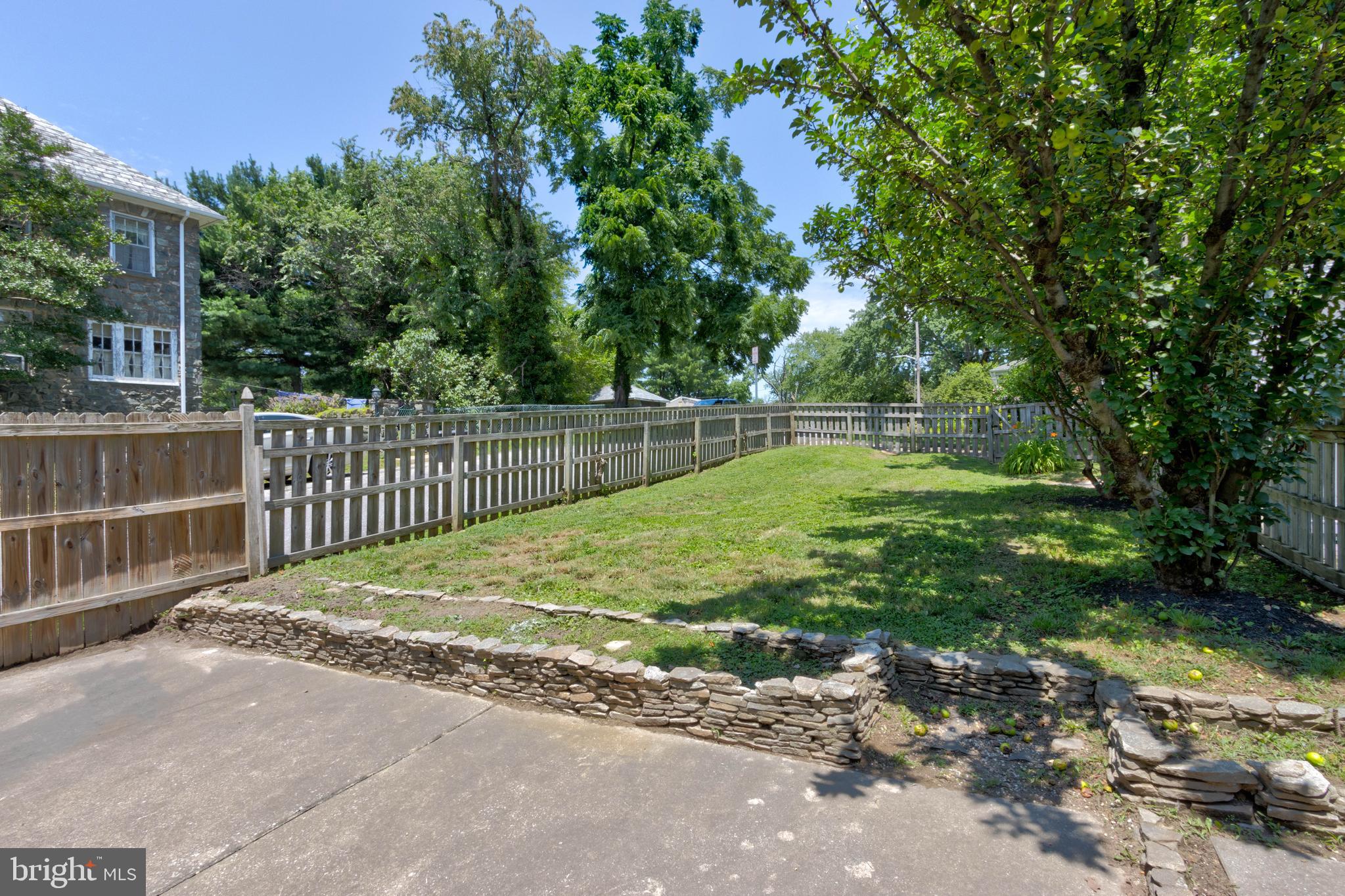 523 Academy Road Catonsville, MD 21228 - Photo 25 of 26 a view of a backyard with a garden
