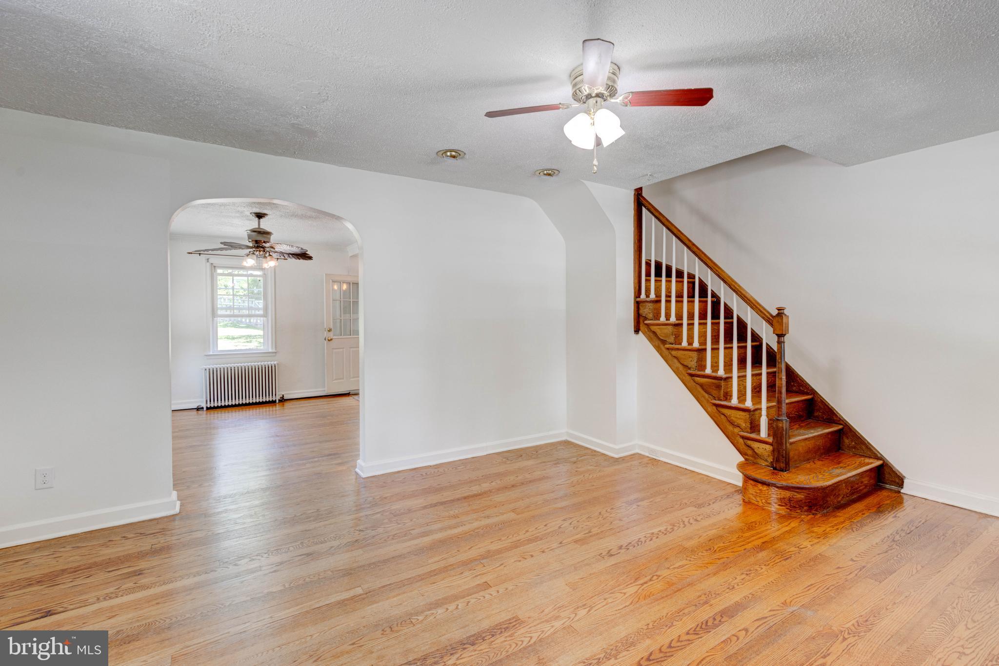 523 Academy Road Catonsville, MD 21228 - Photo 4 of 26 a view of an entryway with wooden floor