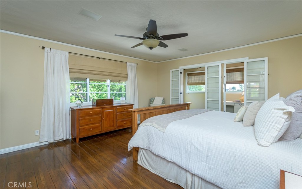 752 Glenview Road Glendale, CA 91202 - Photo 52 of 64 a bed room with a bed and a large window