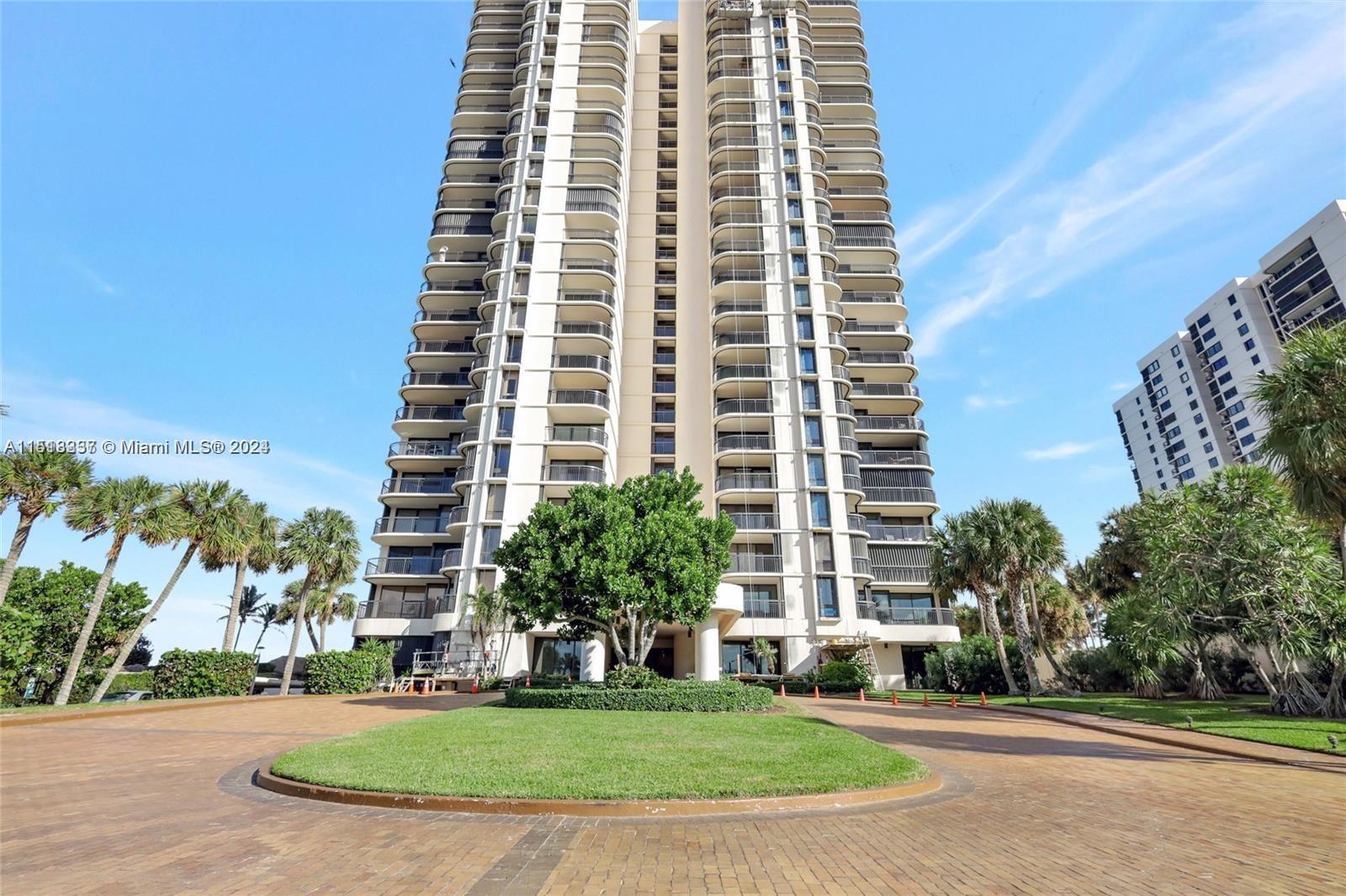 5380 North Ocean Drive, Unit 22J Riviera Beach, FL 33404 - Photo 1 of 83 a front view of a building