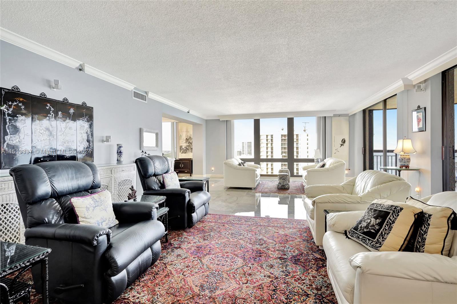 5380 North Ocean Drive, Unit 22J Riviera Beach, FL 33404 - Photo 16 of 83 a living room with furniture or couch and a large window