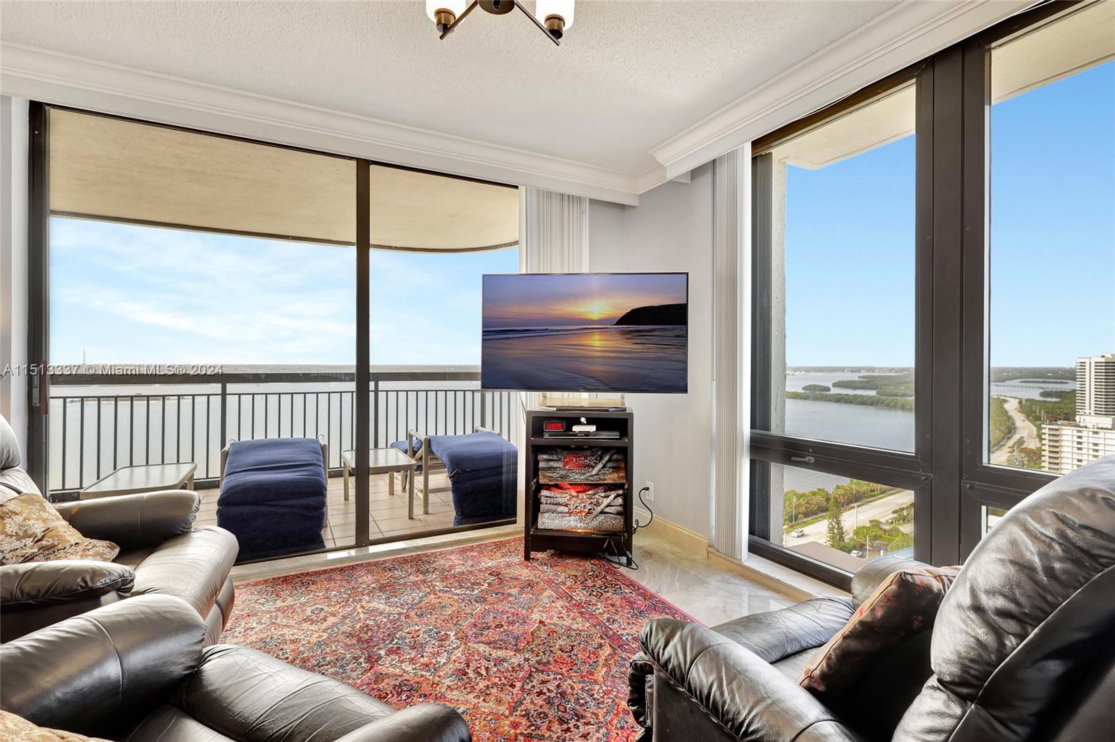 5380 North Ocean Drive, Unit 22J Riviera Beach, FL 33404 - Photo 18 of 83 a living room with furniture and a window