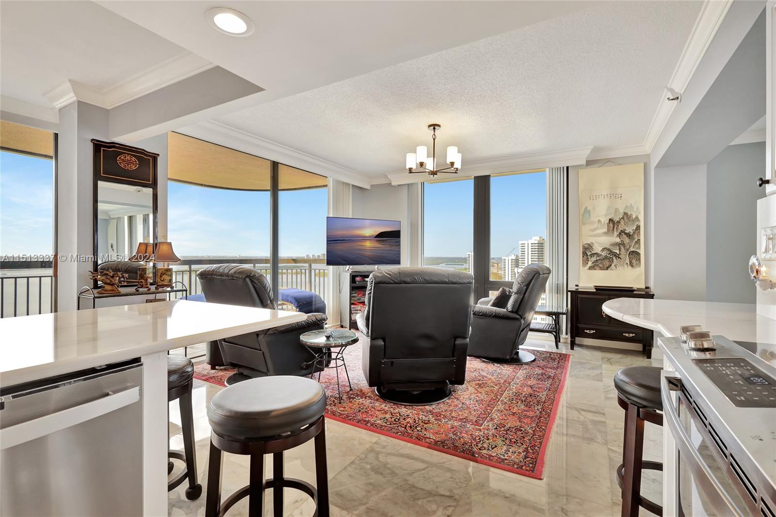 5380 North Ocean Drive, Unit 22J Riviera Beach, FL 33404 - Photo 24 of 83 a view of a dining room with furniture window and outside view