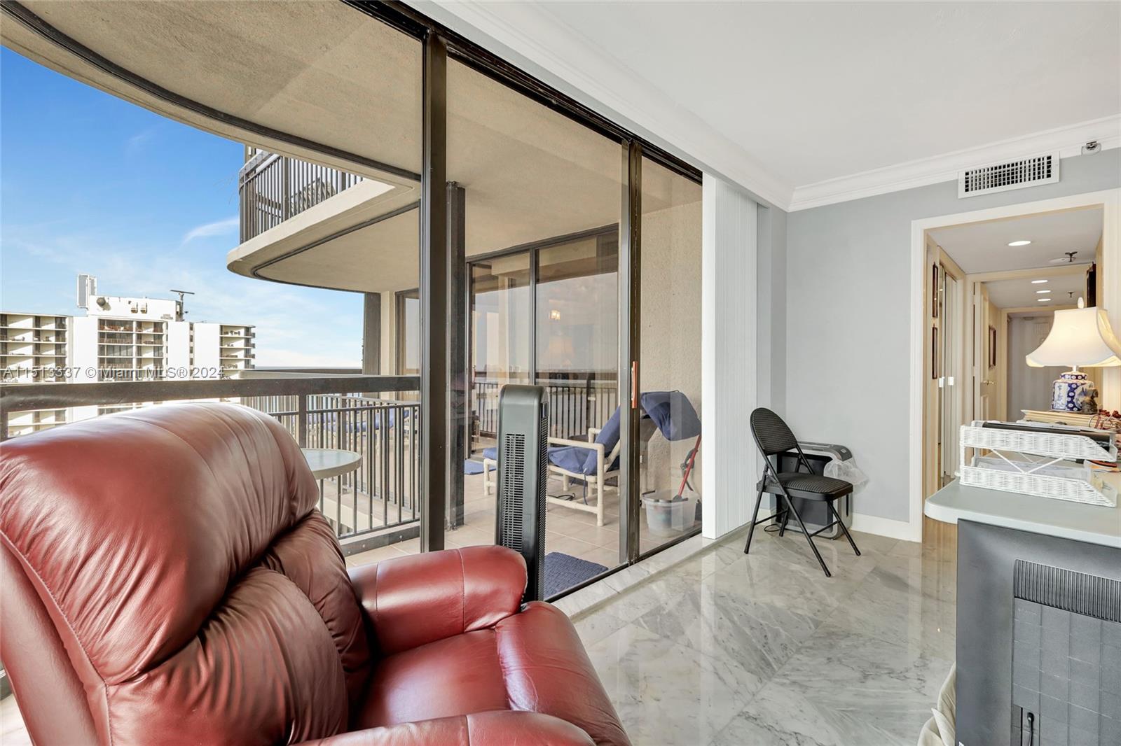5380 North Ocean Drive, Unit 22J Riviera Beach, FL 33404 - Photo 61 of 83 a living room with furniture