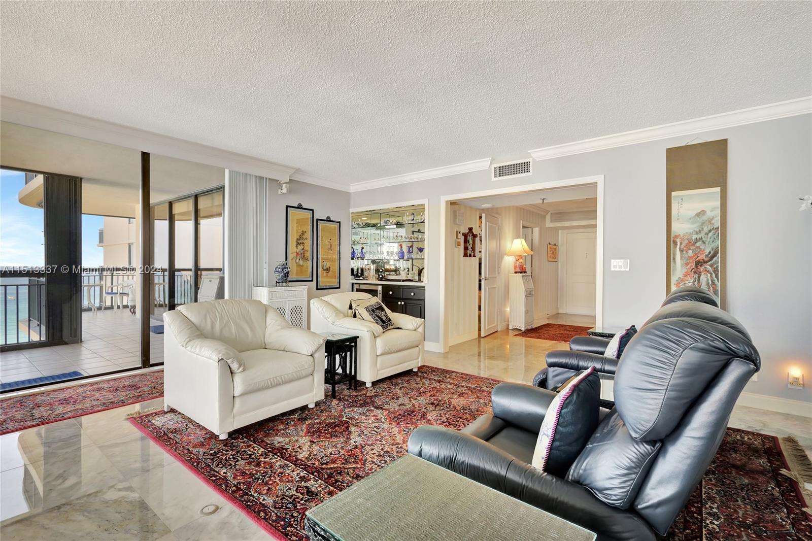 5380 North Ocean Drive, Unit 22J Riviera Beach, FL 33404 - Photo 8 of 83 a living room with furniture or couch and a large window