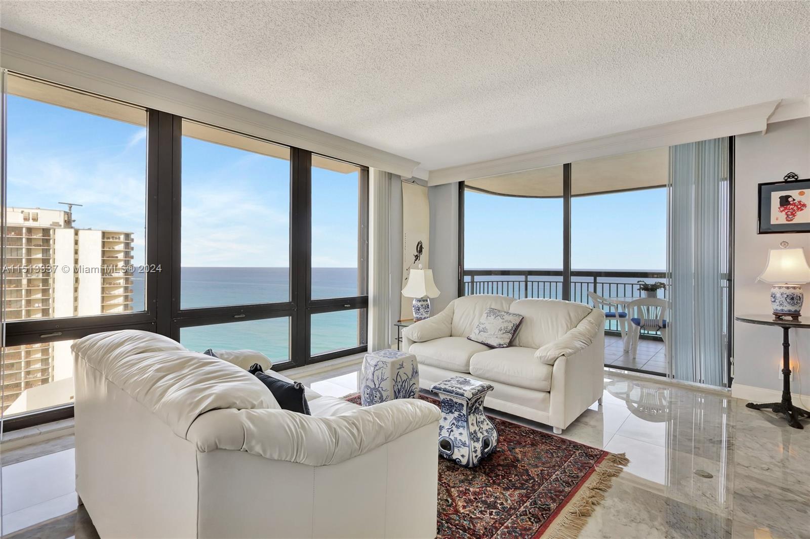 5380 North Ocean Drive, Unit 22J Riviera Beach, FL 33404 - Photo 9 of 83 a living room with furniture and a large window