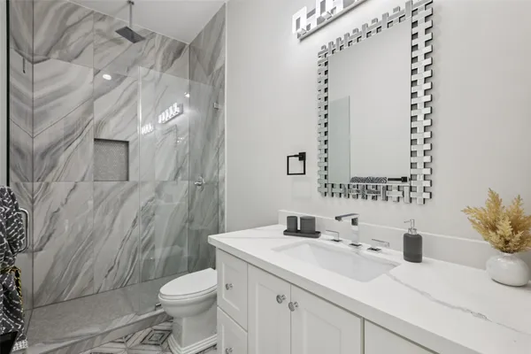 a close up of a sink and a mirror
