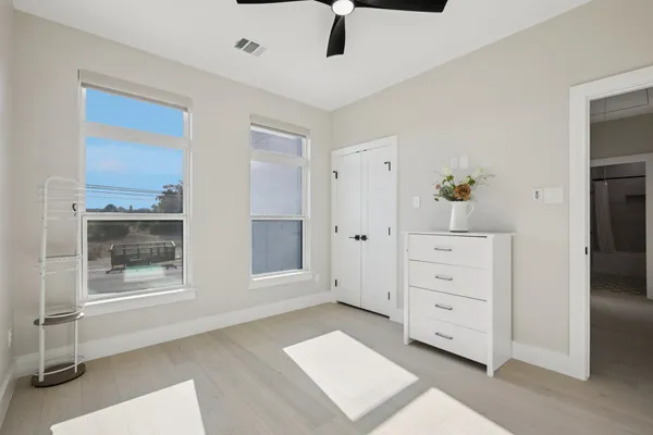 a view of an empty room with a window