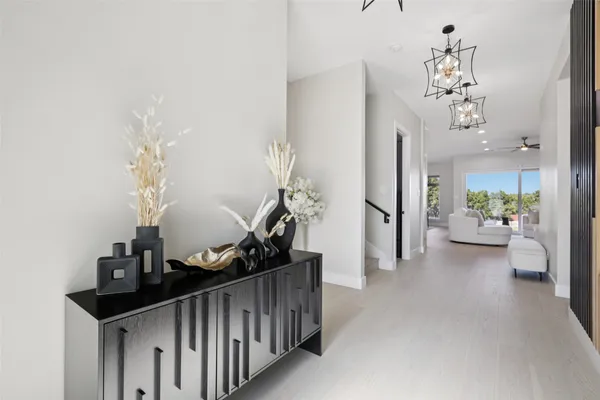 a view of a hallway view with staircase