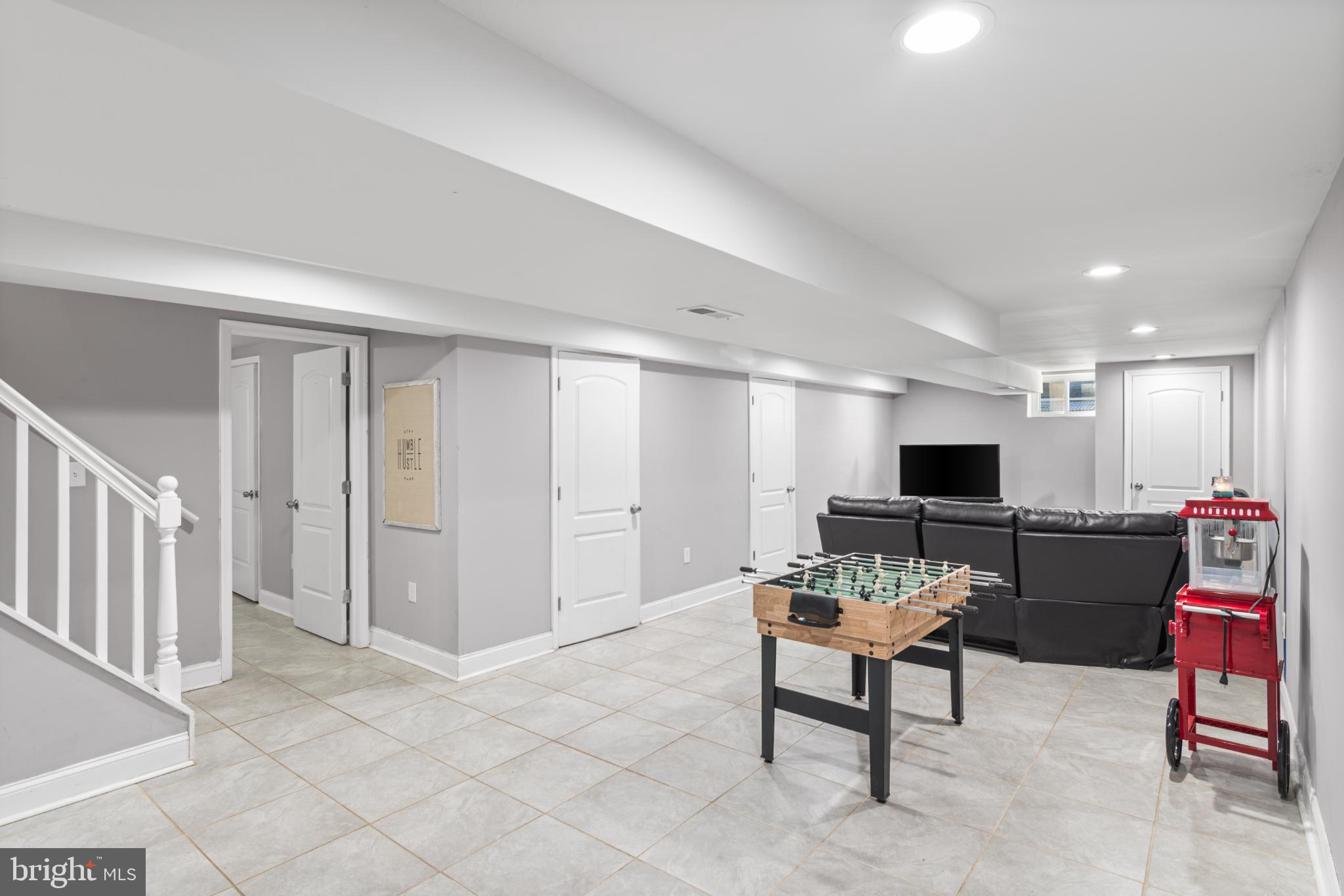 5219 West North Avenue Baltimore, MD 21207 - Photo 14 of 34 Spacious, modern basement retreat awaits.