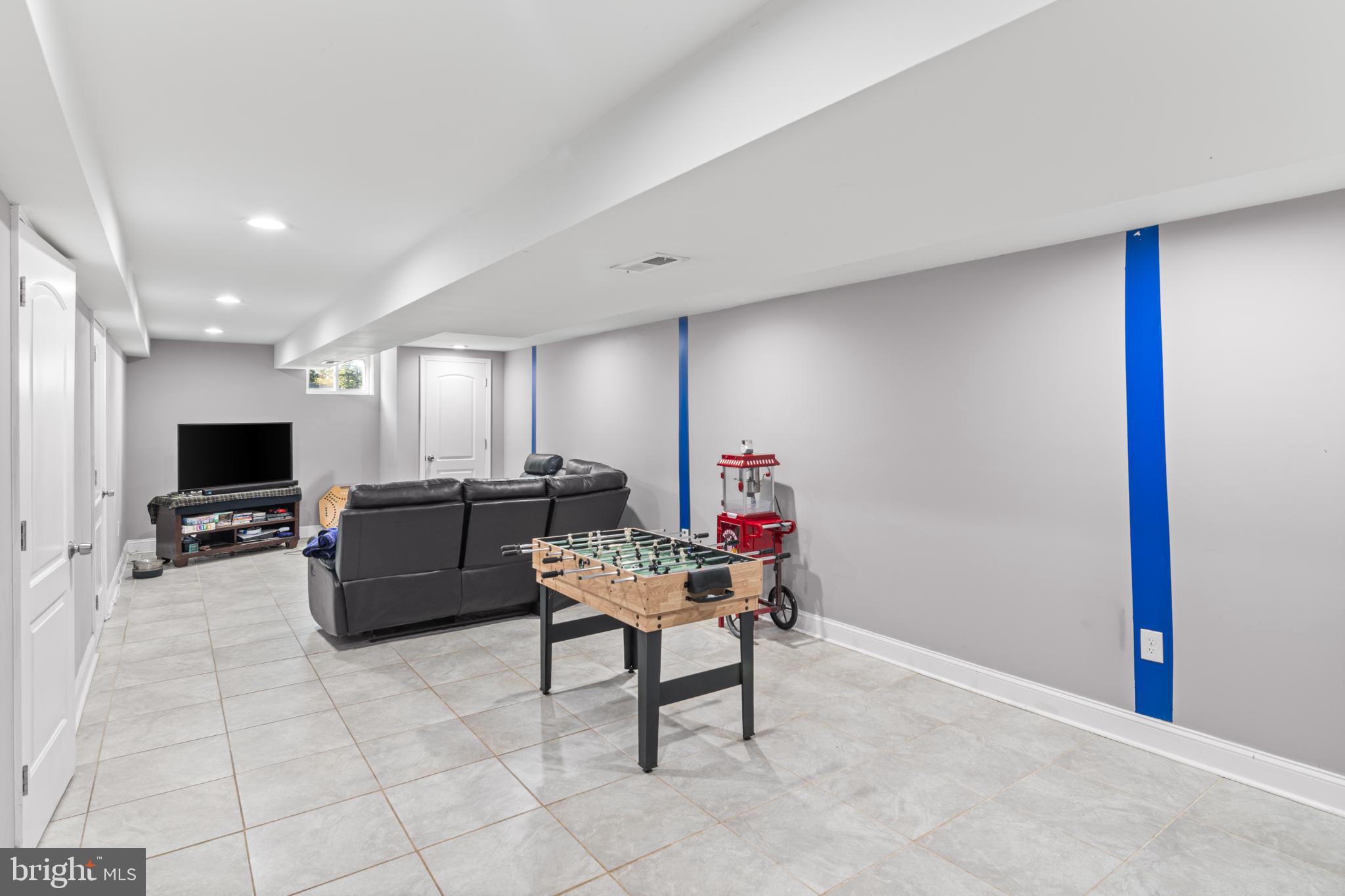 5219 West North Avenue Baltimore, MD 21207 - Photo 15 of 34 Spacious basement with modern finishes.
