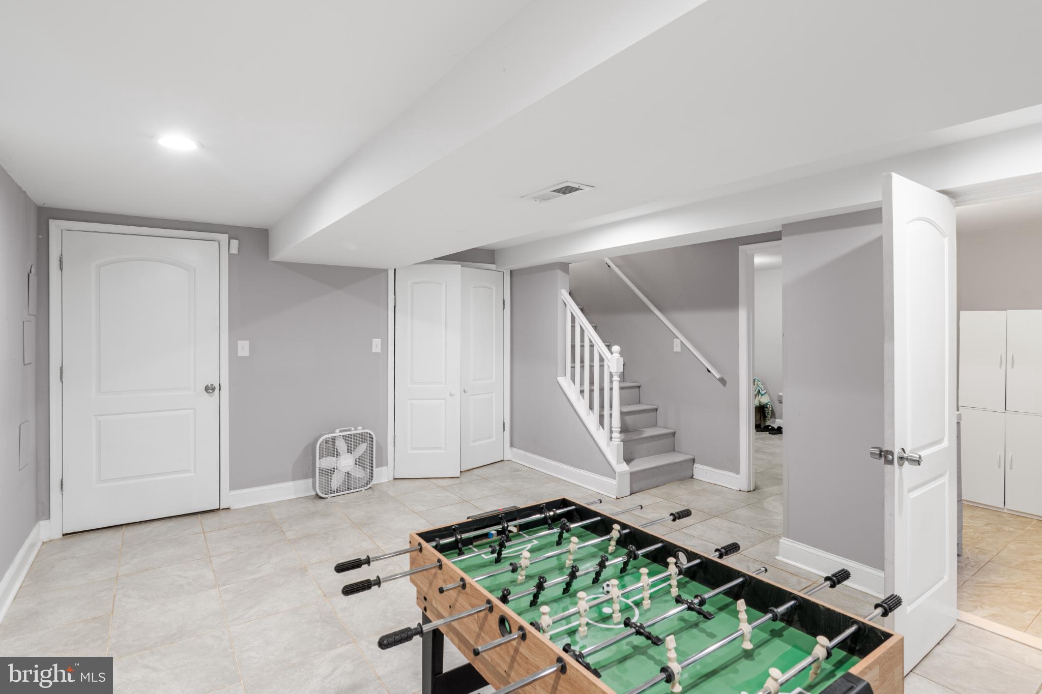 5219 West North Avenue Baltimore, MD 21207 - Photo 18 of 34 Spacious basement with playful vibes.