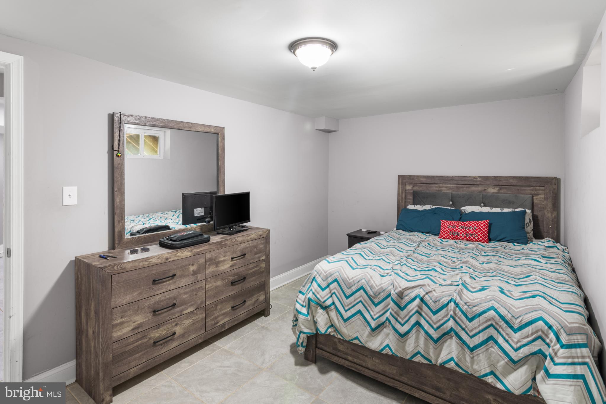 5219 West North Avenue Baltimore, MD 21207 - Photo 20 of 34 Lower Level cozy bedroom with closet