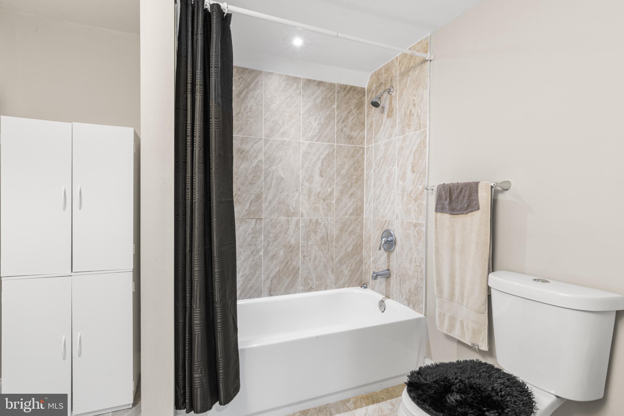 5219 West North Avenue Baltimore, MD 21207 - Photo 25 of 34 Spacious Lower Level Bathroom