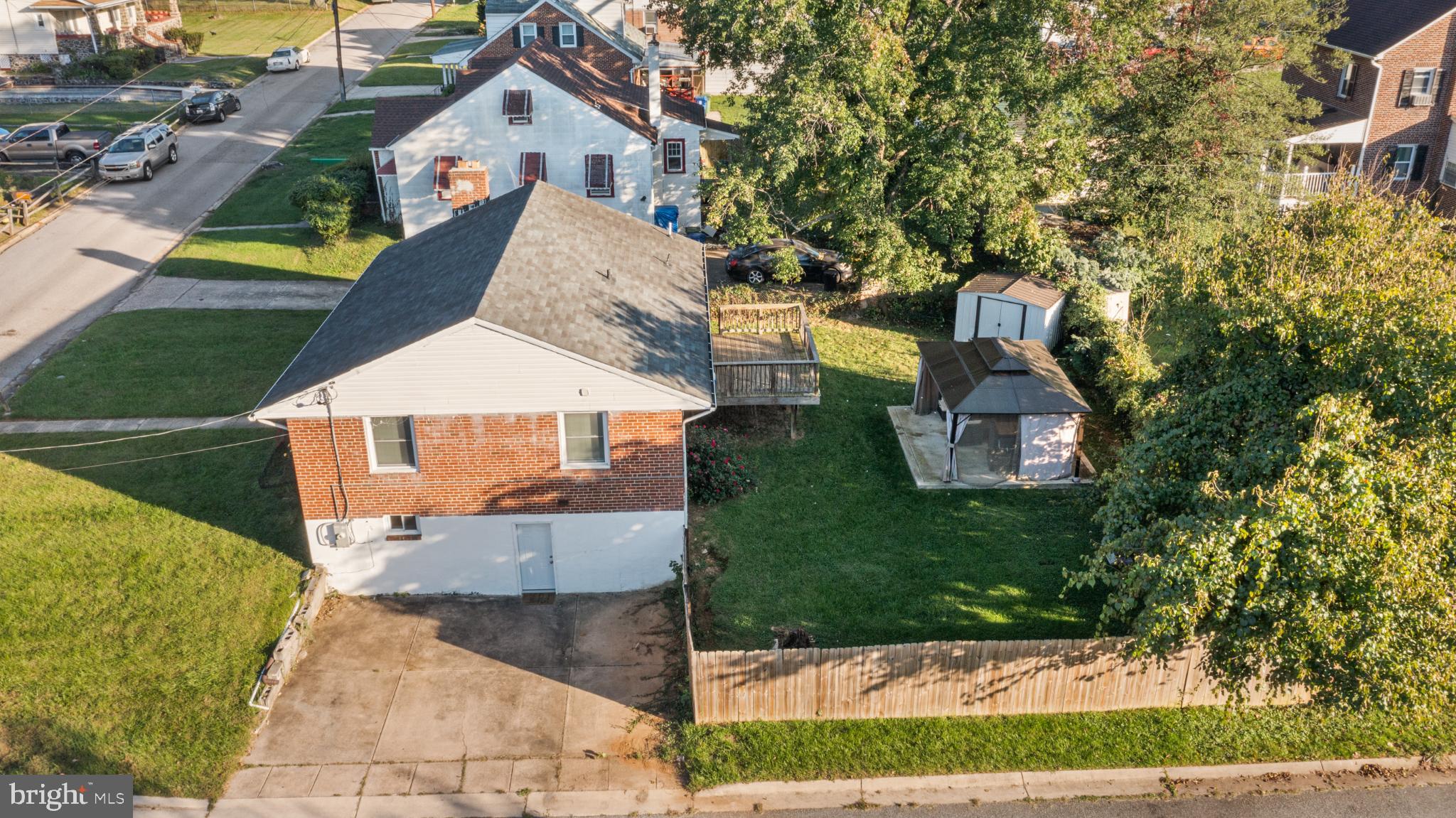 5219 West North Avenue Baltimore, MD 21207 - Photo 3 of 34 Large fenced-in backyard.