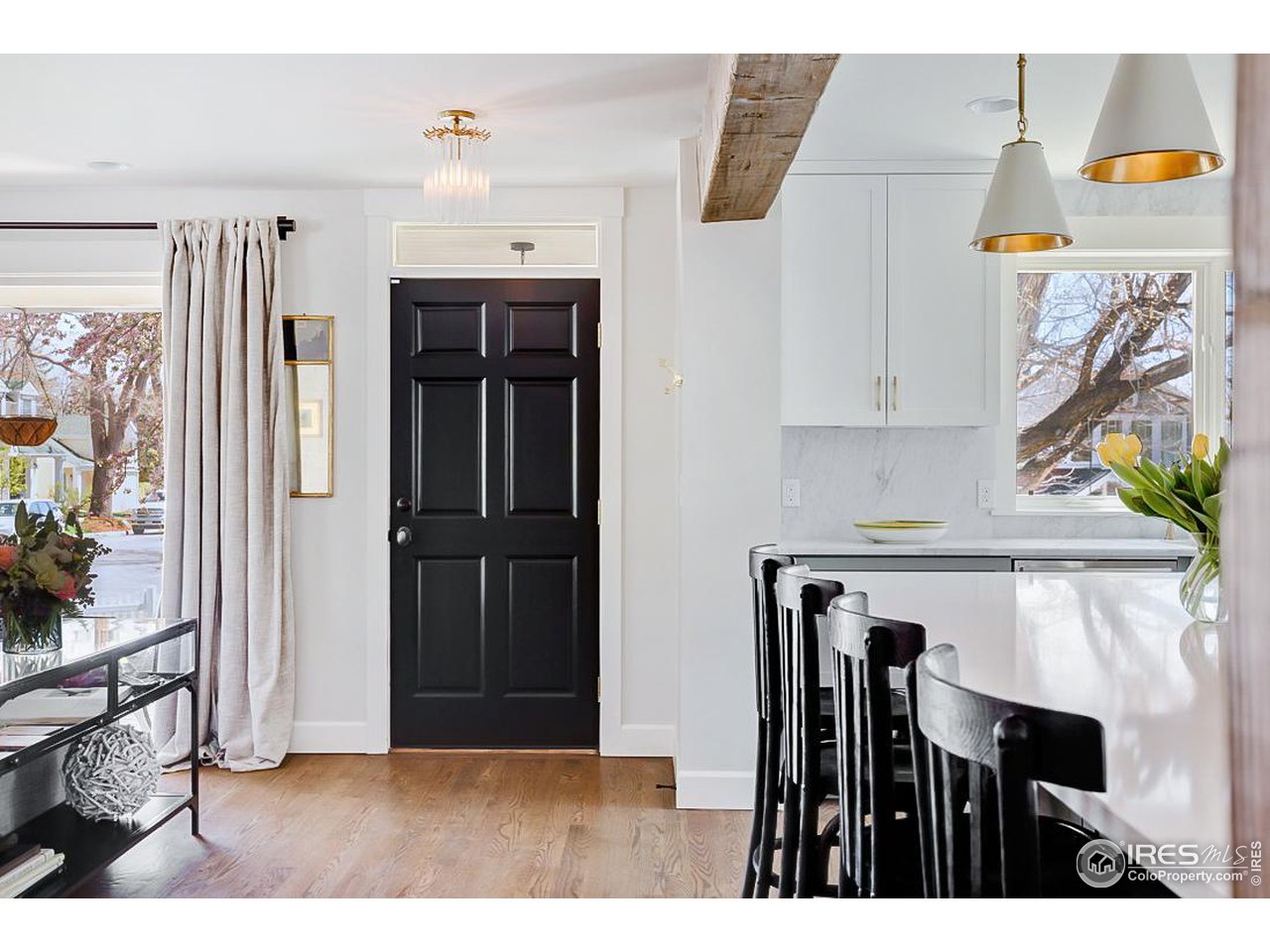 730 Evergreen Avenue Boulder, CO 80304 - Photo 12 of 33 a view of kitchen island with furniture and wooden floor