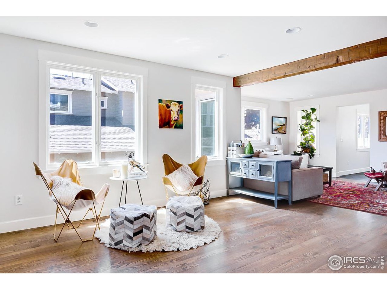 730 Evergreen Avenue Boulder, CO 80304 - Photo 13 of 33 a living room with furniture a rug and a large window