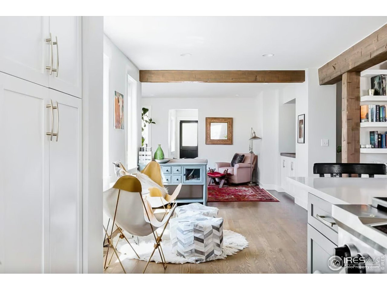 730 Evergreen Avenue Boulder, CO 80304 - Photo 14 of 33 a living room with furniture and a wooden floor