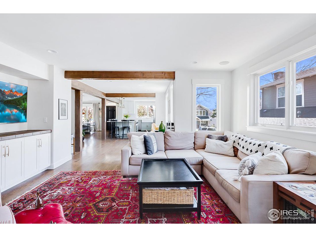 730 Evergreen Avenue Boulder, CO 80304 - Photo 15 of 33 a living room with furniture rug and wooden floor