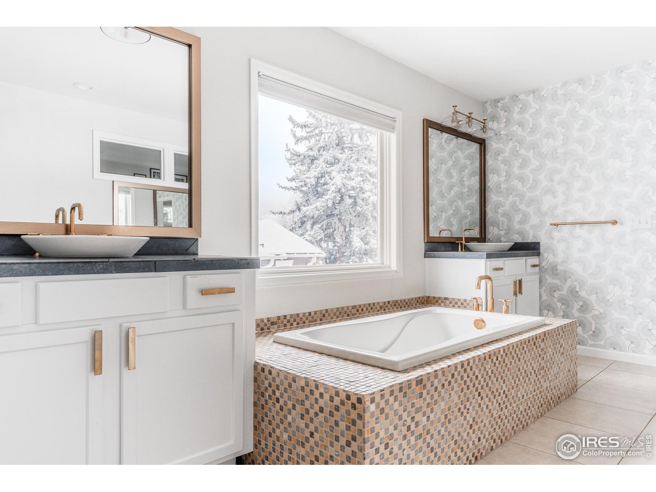 730 Evergreen Avenue Boulder, CO 80304 - Photo 19 of 33 a bathroom with a tub a sink and a window