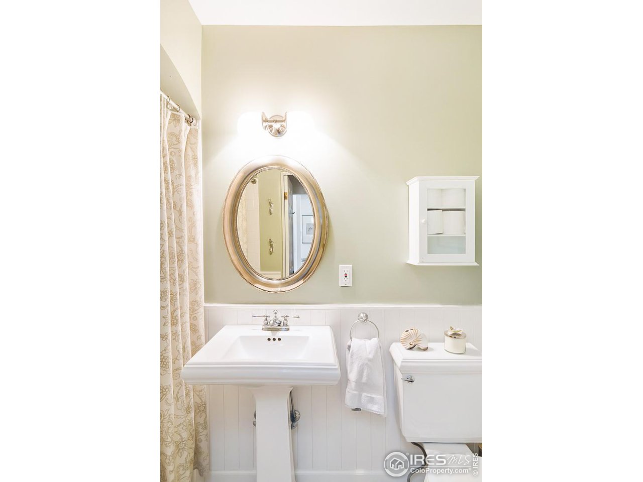 730 Evergreen Avenue Boulder, CO 80304 - Photo 23 of 33 a bathroom with a sink and a mirror