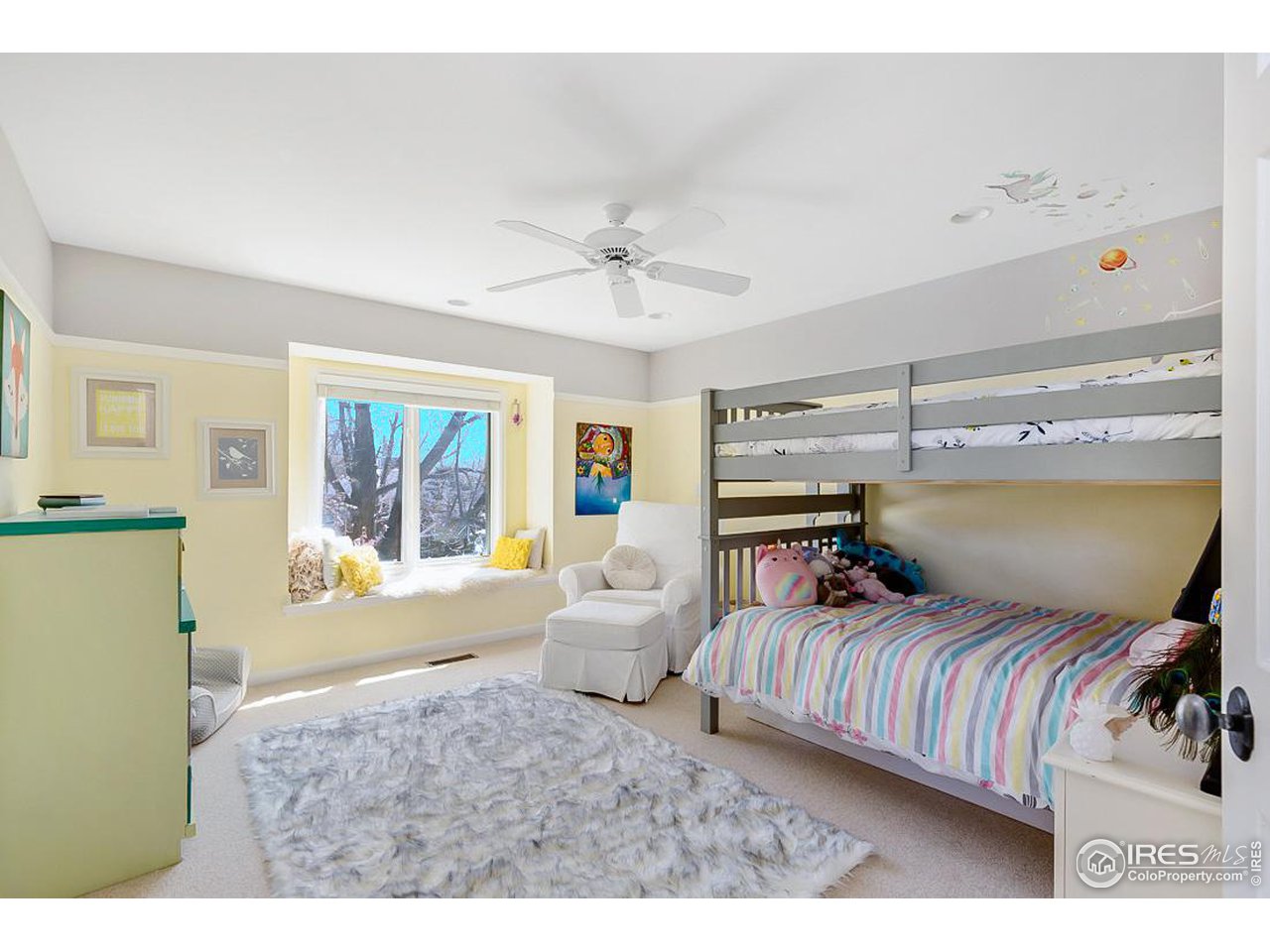 730 Evergreen Avenue Boulder, CO 80304 - Photo 24 of 33 a bedroom with furniture and a large window