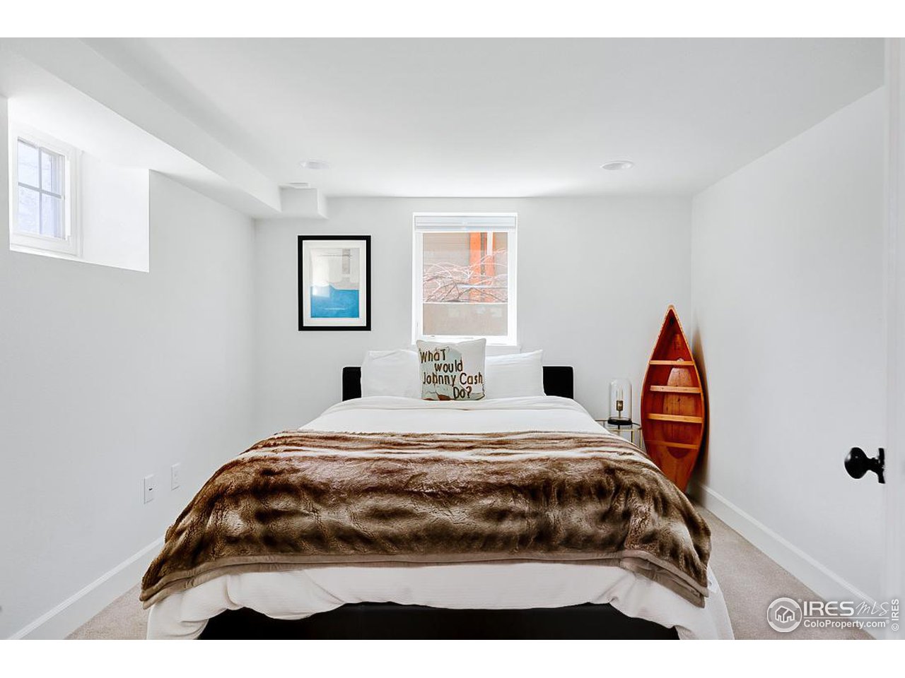 730 Evergreen Avenue Boulder, CO 80304 - Photo 27 of 33 a bedroom with a bed and a window