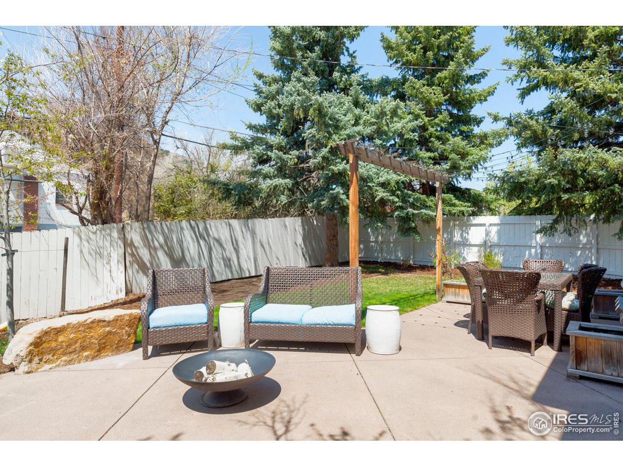 730 Evergreen Avenue Boulder, CO 80304 - Photo 29 of 33 a backyard of a house with table and chairs
