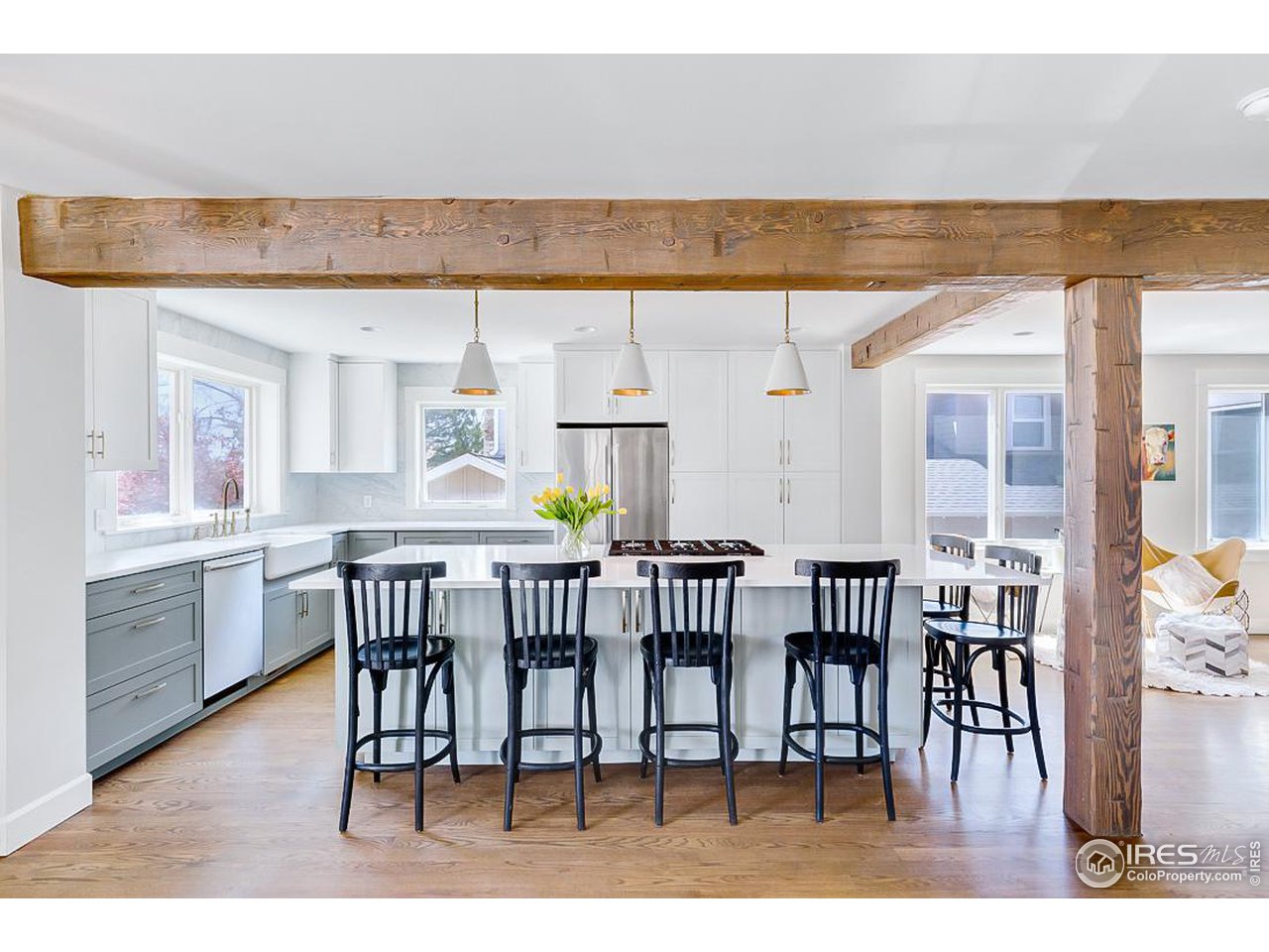 730 Evergreen Avenue Boulder, CO 80304 - Photo 4 of 33 a dining room with furniture and wooden floor