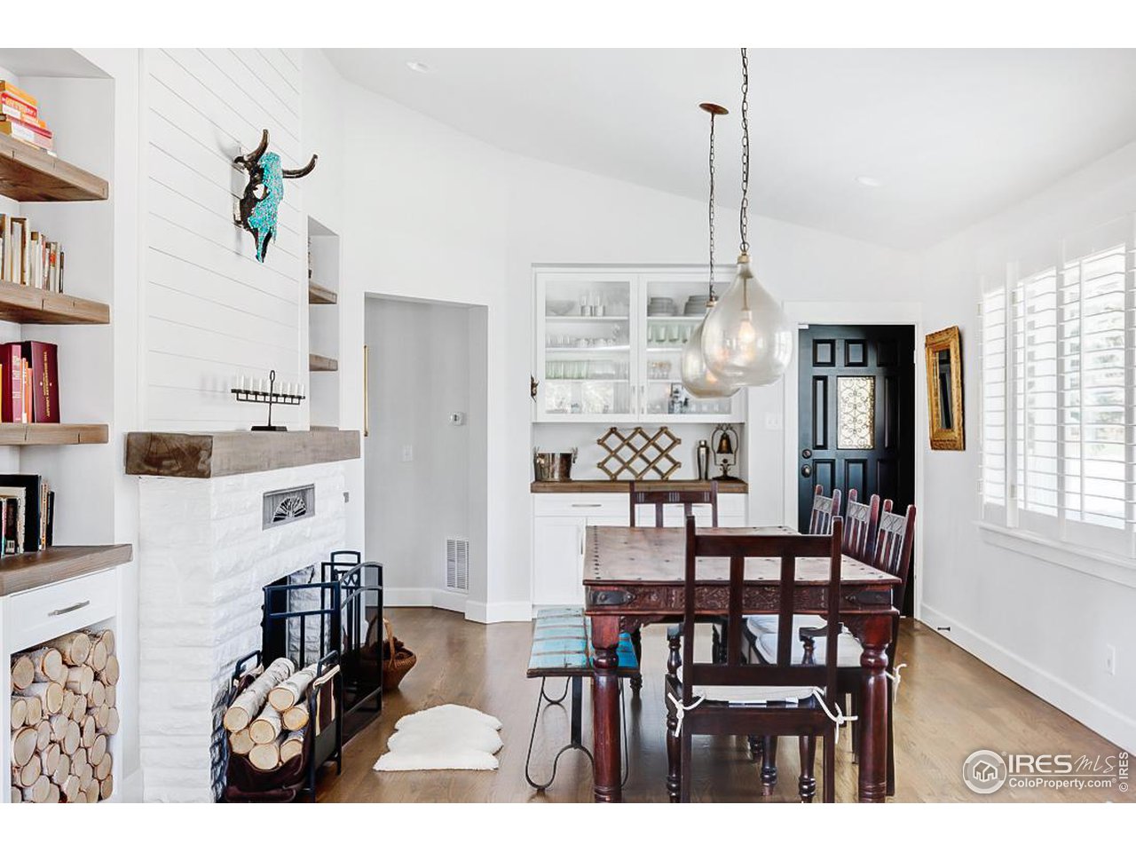 730 Evergreen Avenue Boulder, CO 80304 - Photo 7 of 33 a view of a dining room with furniture and chandelier