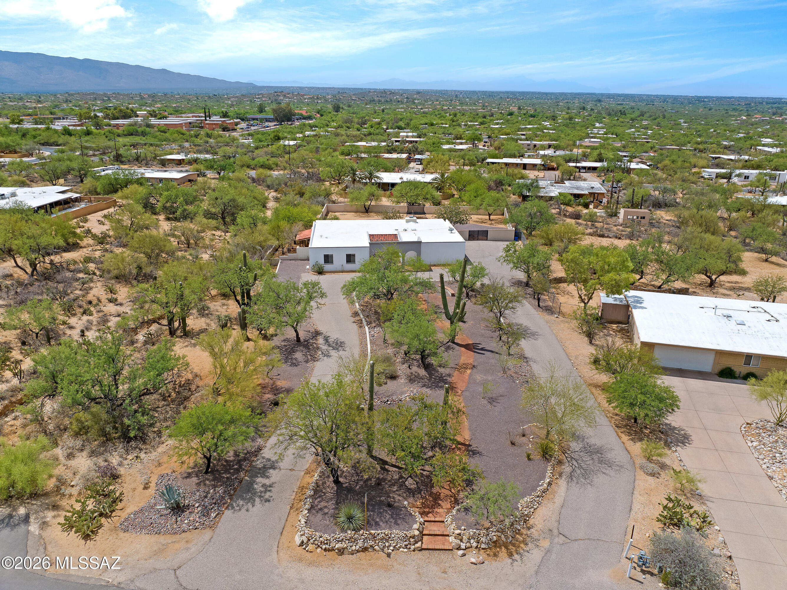 9420 East Ravine Trail Tucson, AZ 85749 - Photo 36 of 39 an aerial view of residential houses with outdoor space