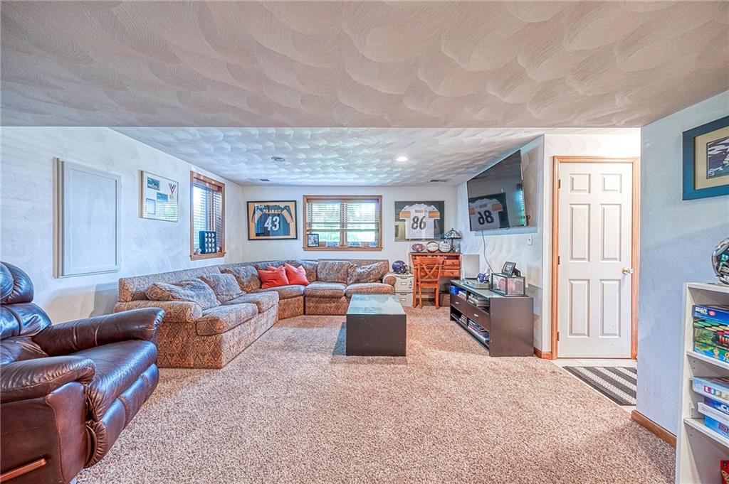 124 Rustic Ridge Drive Pittsburgh, PA 15239 - Photo 16 of 30 a living room with furniture and a wooden floor