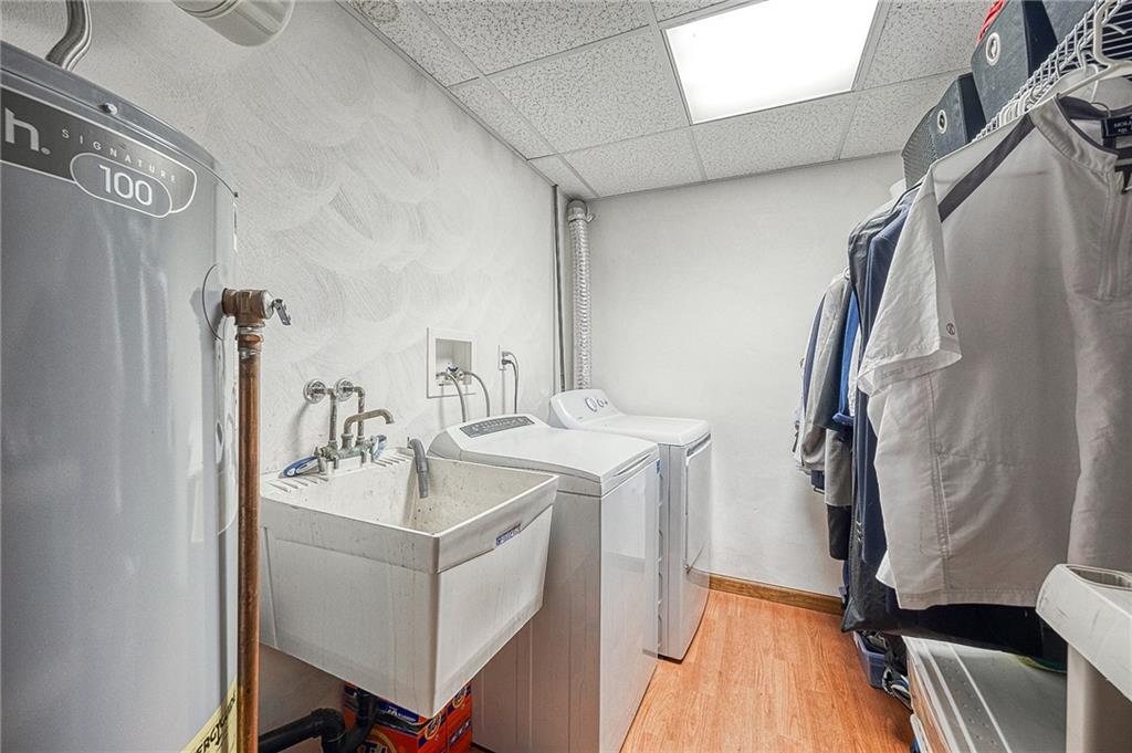 124 Rustic Ridge Drive Pittsburgh, PA 15239 - Photo 21 of 30 a bathroom with a sink vanity and a mirror