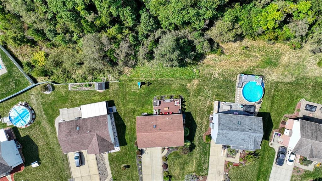 124 Rustic Ridge Drive Pittsburgh, PA 15239 - Photo 24 of 30 an aerial view of a house with outdoor space and a swimming pool
