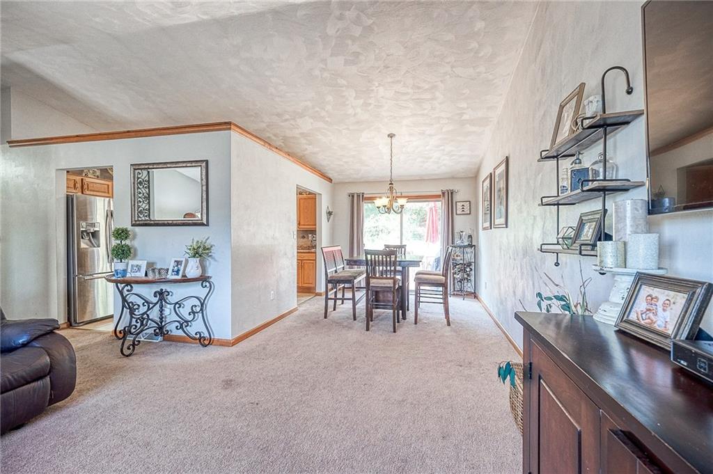 124 Rustic Ridge Drive Pittsburgh, PA 15239 - Photo 4 of 30 a view of a livingroom with furniture and window