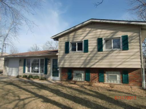 571 Redwood Road Bolingbrook, IL 60440 - Photo 1 of 1 a front view of a house with a yard