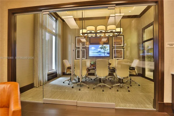 a view of a living room and bathroom