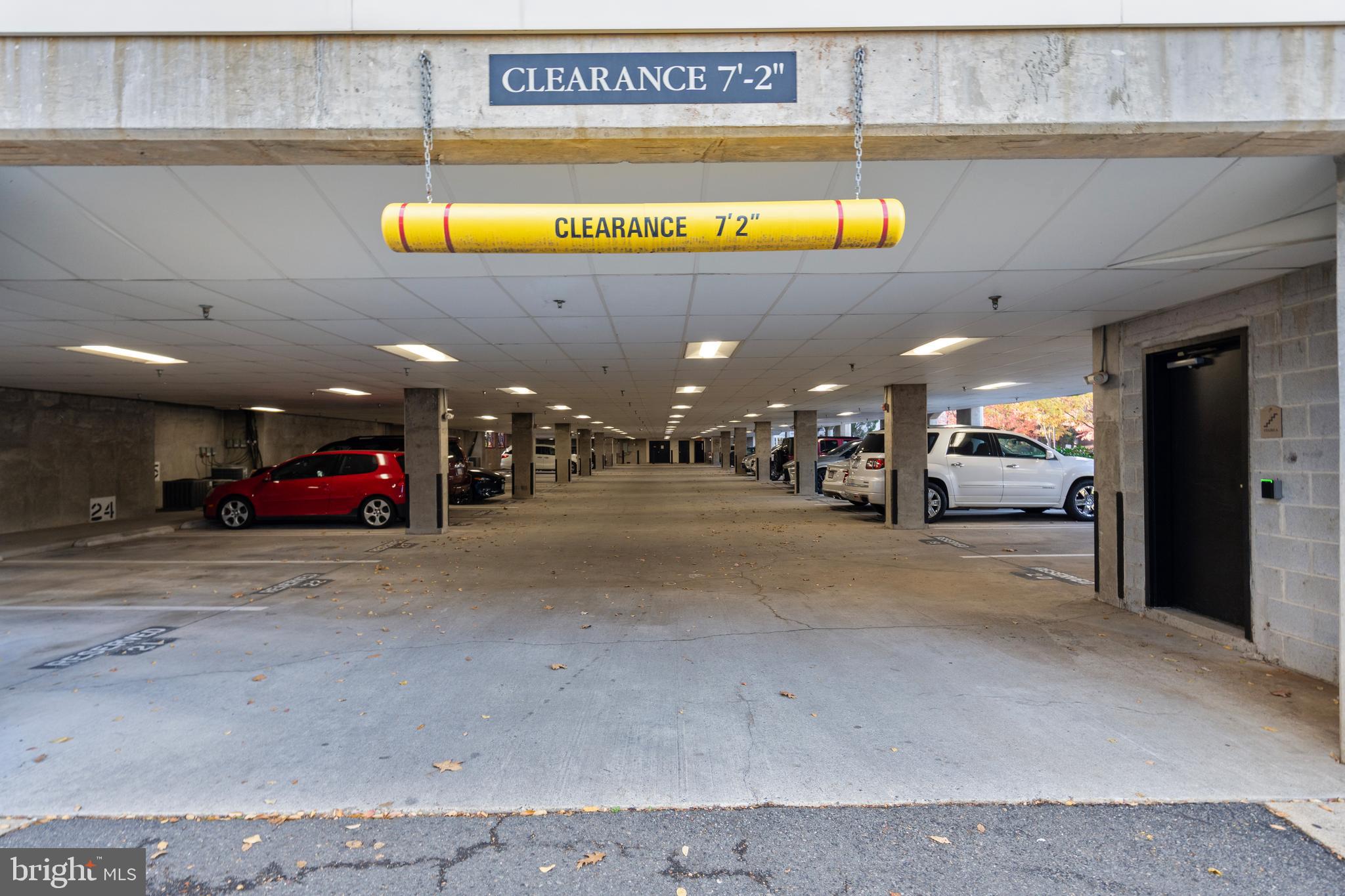 3851 Aristotle Court, Unit 1402 Fairfax, VA 22030 - Photo 30 of 31 a view of a building with car parked