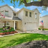 a view of a two chairs in the deck