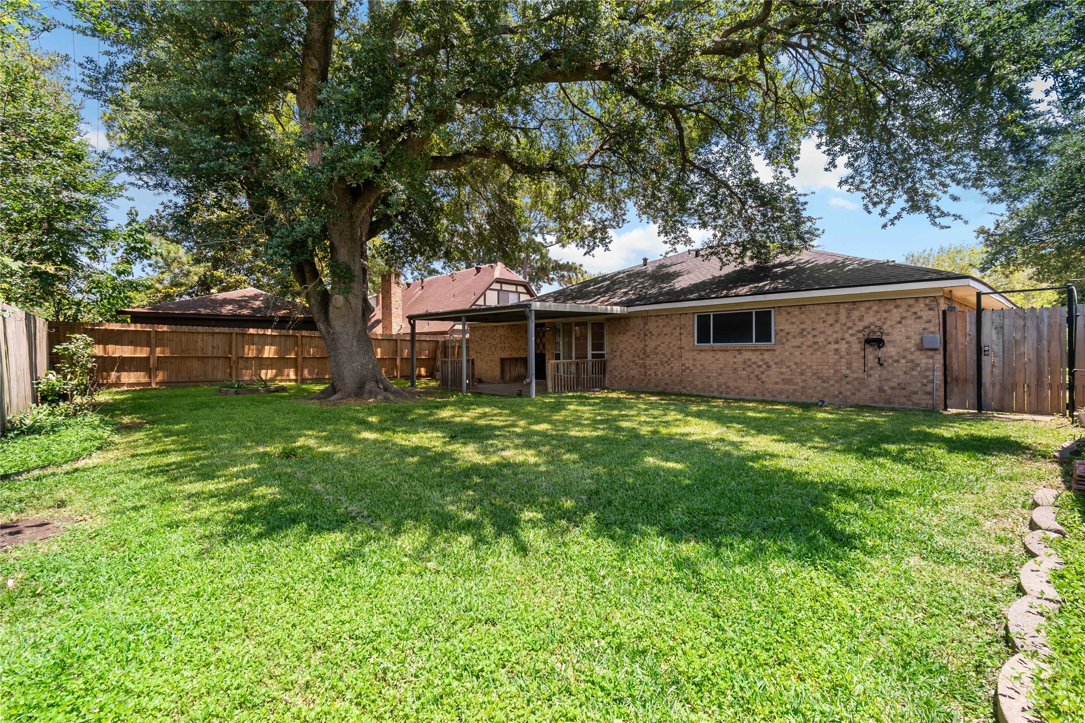 4302 Seneca Street Pasadena, TX 77504 - Photo 18 of 19 a view of house with backyard
