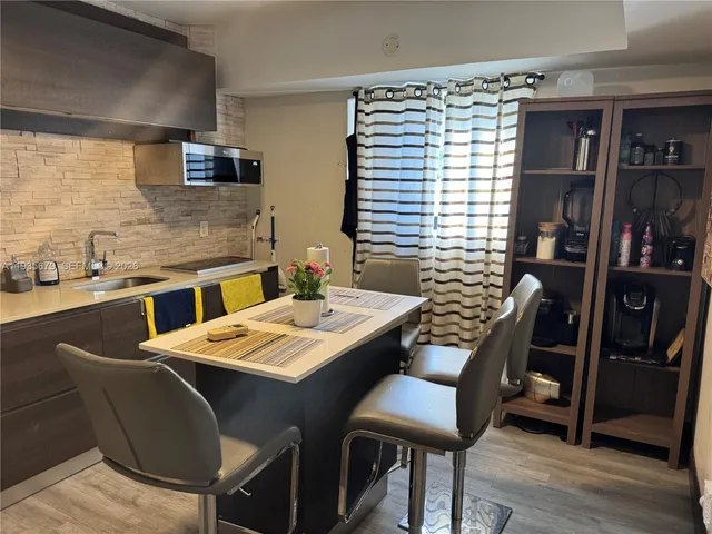 a view of a dining room with furniture