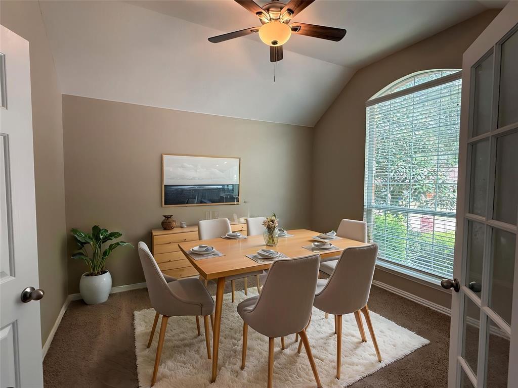 108 Cole Street Forney, TX 75126 - Photo 16 of 39 a view of a dining room with a table and chairs